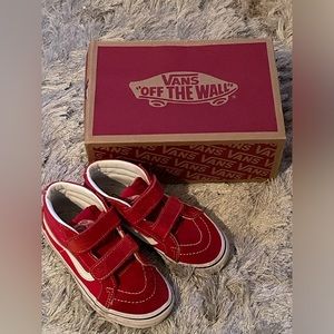 Red Vans Sk8-Hi mid-top shoe